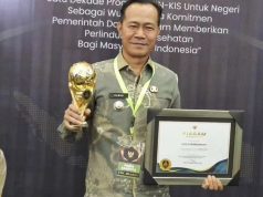 Pj Wako Elman Terima Penghargaan UHC Tahun 2024